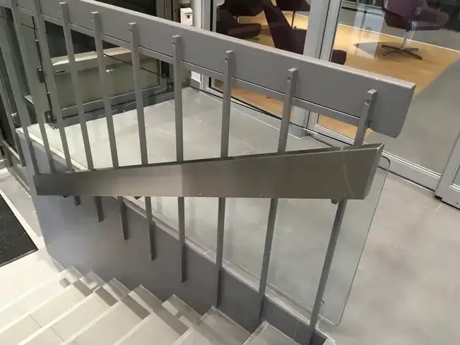 Metal railing for stairs inside office building Blog Image
